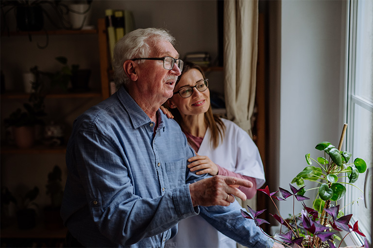 healthcare worker or caregiver visiting senior man 2024 10 22 10 38 08 utc | Dunham Care Homes
